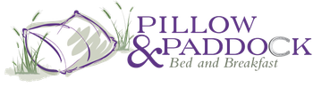 A logo for pillow and paddock bed and breakfast