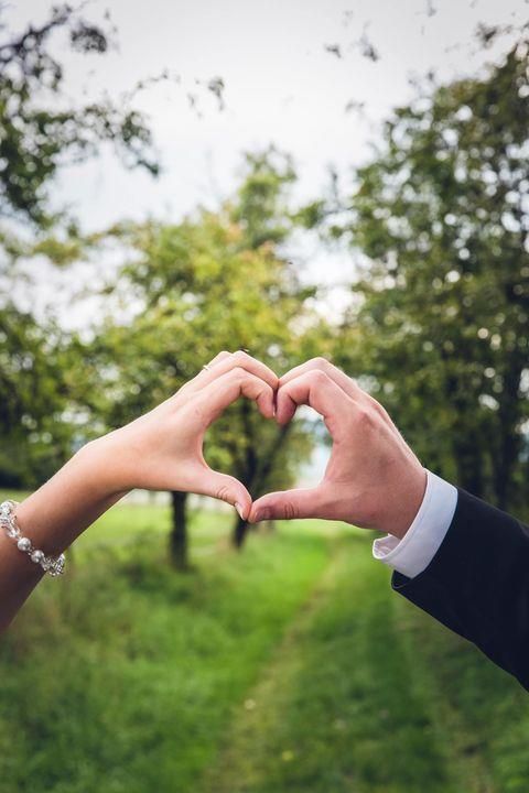 Two hands making heart