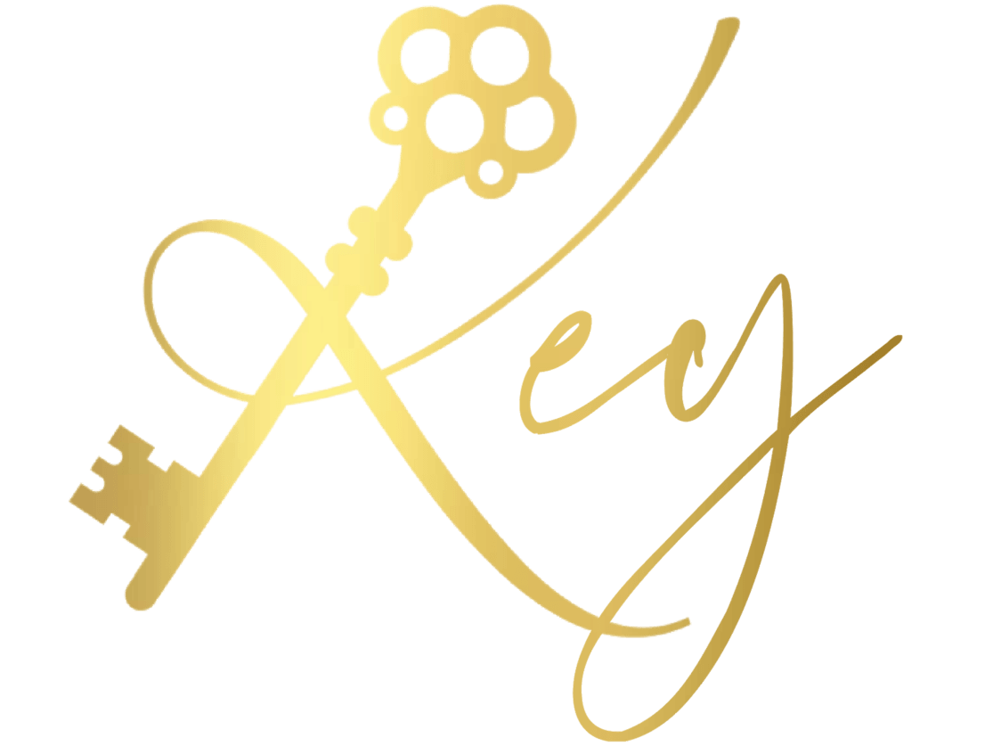 Gold stylized key with the word