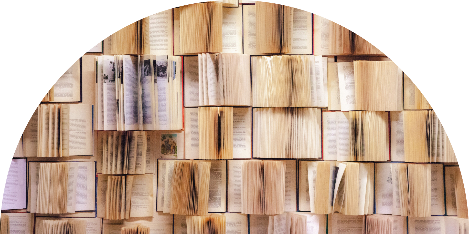 A bunch of books are stacked on top of each other