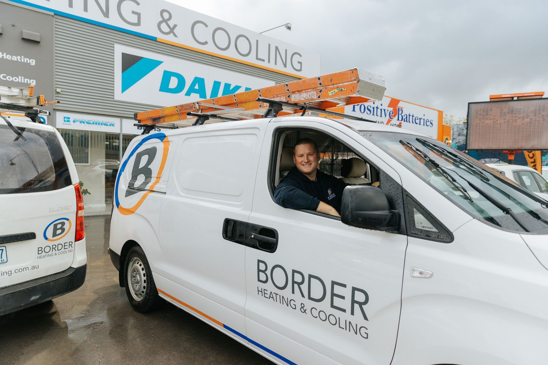 Border heating & cooling van outside showroom