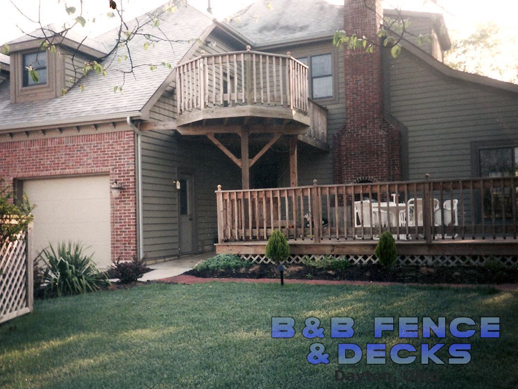House With Wooden Deck Above — Dayton, OH — B & B Fence & Decks LLC