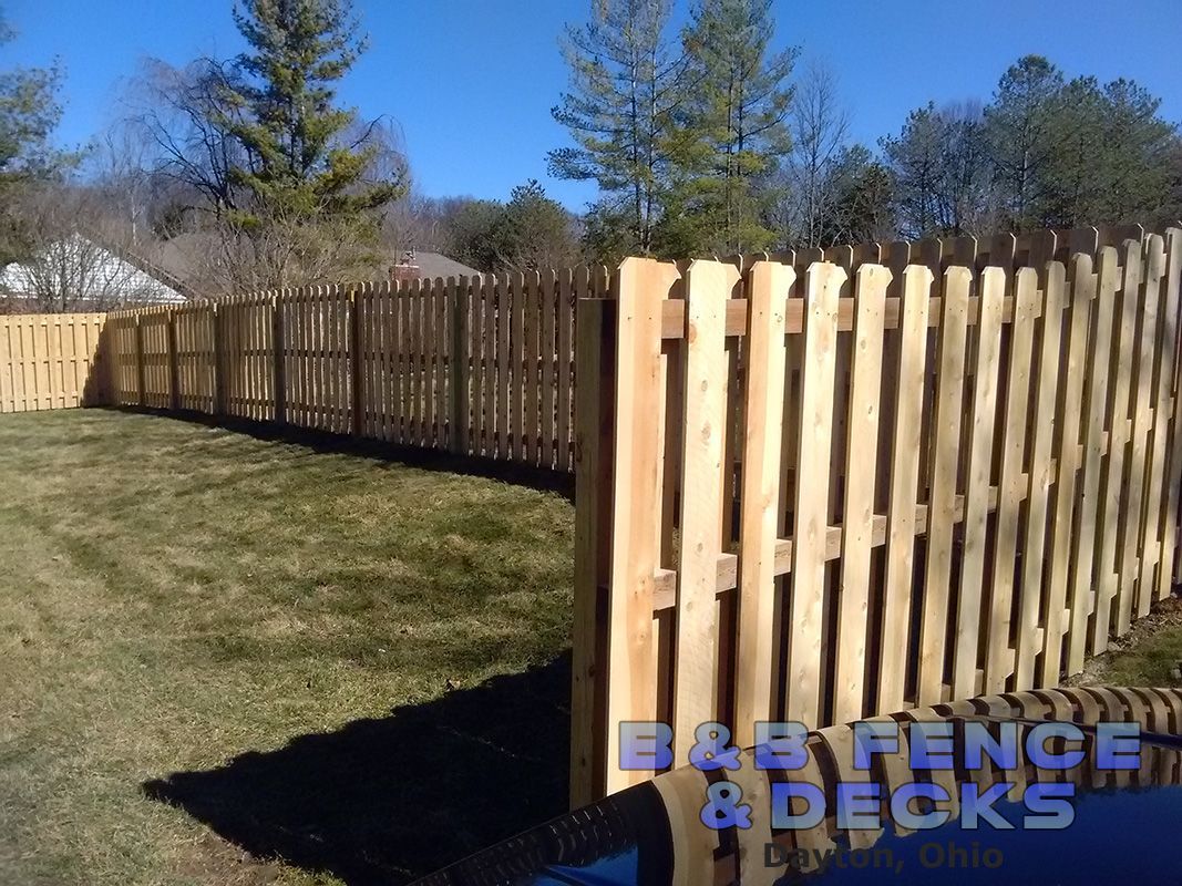 Blue Sky and Wooden Fence — Dayton, OH — B & B Fence & Decks LLC