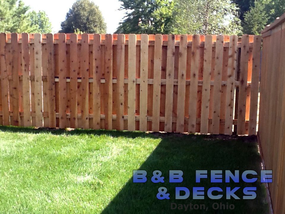 Wooden Fence and Sunlight — Dayton, OH — B & B Fence & Decks LLC