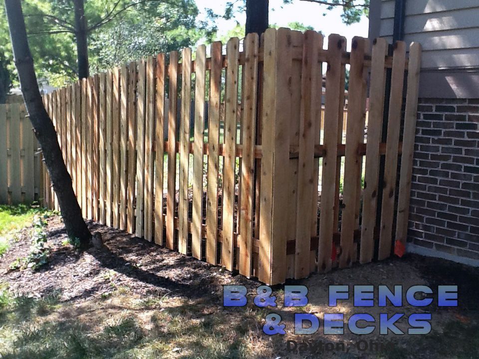 Trees and Wooden Fence — Dayton, OH — B & B Fence & Decks LLC
