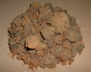A pile of brown rocks is sitting on a table