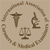 Logo for the International Association of Coroners & Medical Examiners with scales and caduceus on beige background
