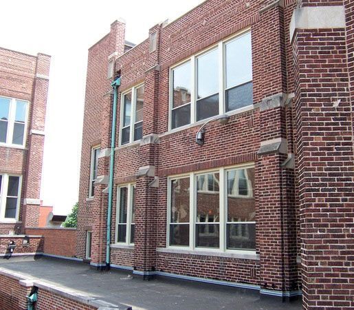 A large brick building with lots of windows