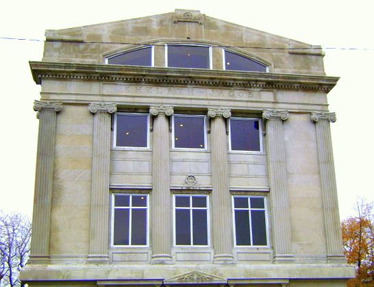 A large building with a lot of windows and columns