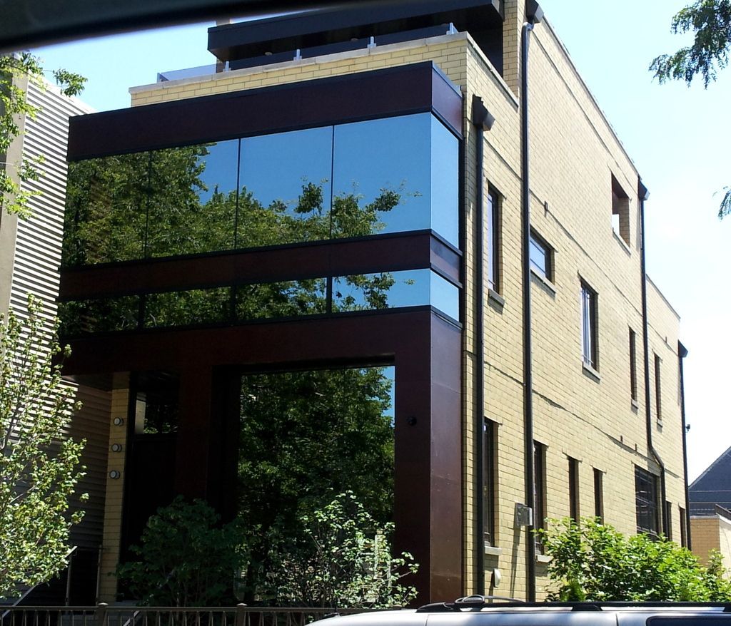A large brick building with a lot of windows
