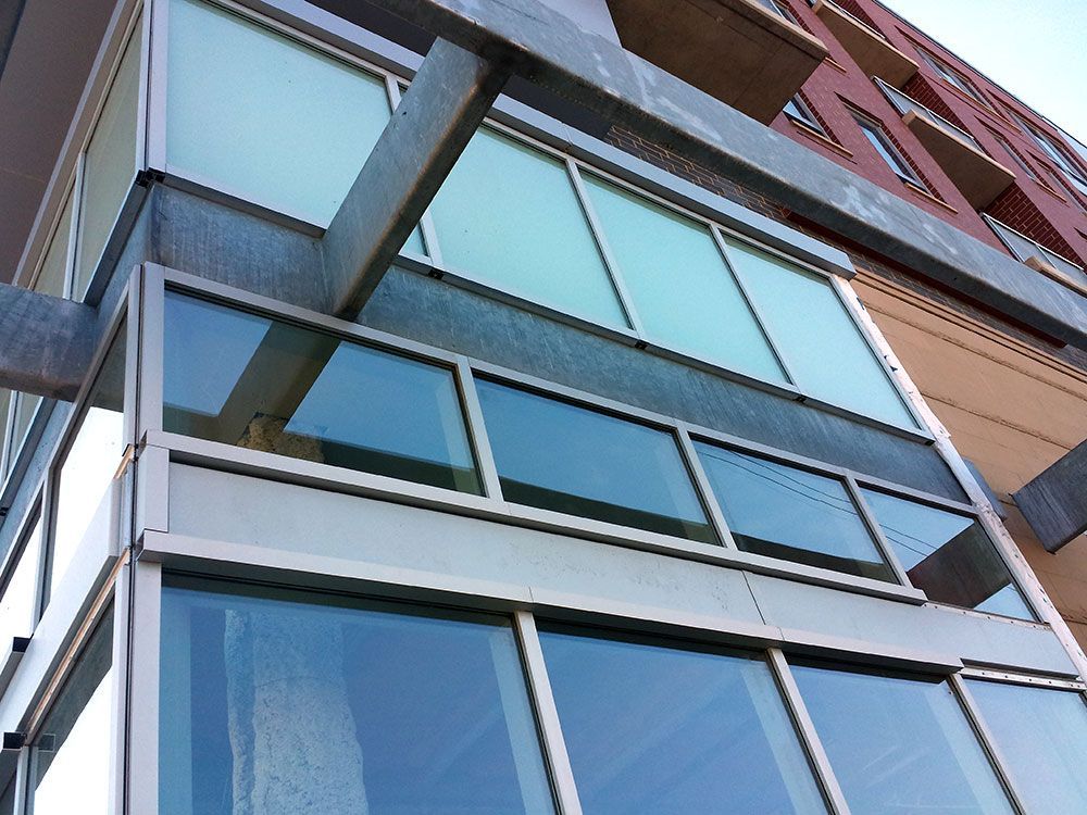 A building with a lot of windows and a balcony