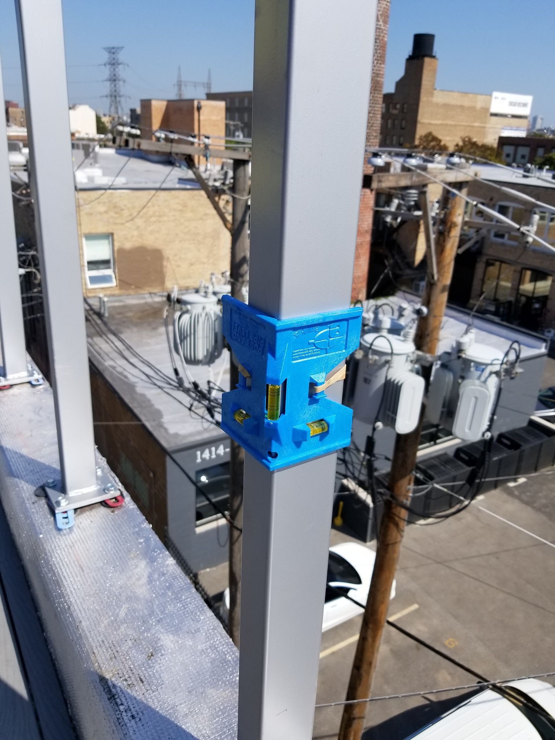 A 3d printed object is attached to a metal pole