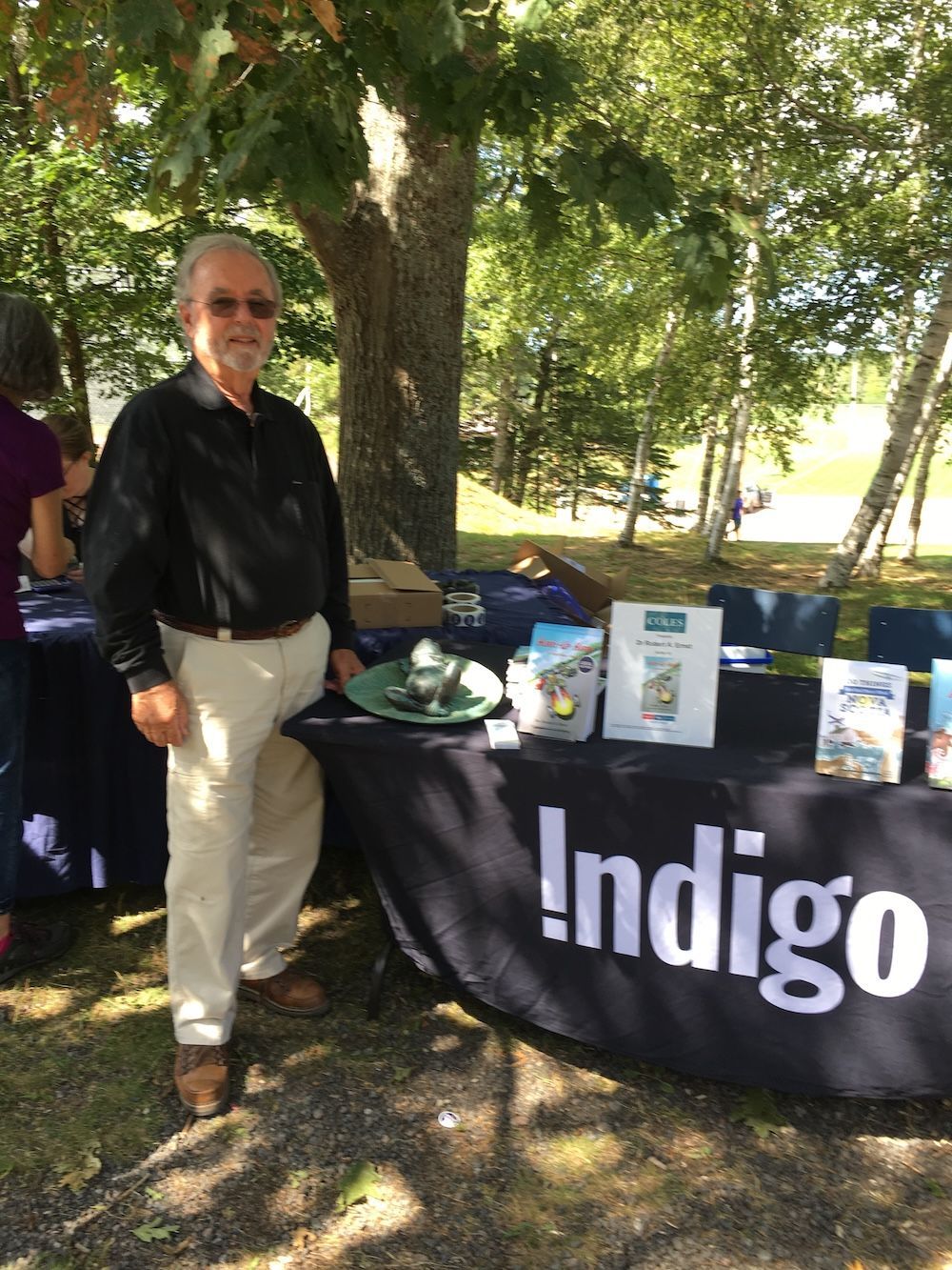 Man standing at a table with 