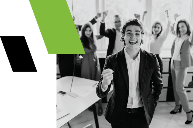 Office team celebrating with a smiling man in front; green and black geometric shapes at left.
