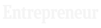 Faded white “Entrepreneur” wordmark on a light background