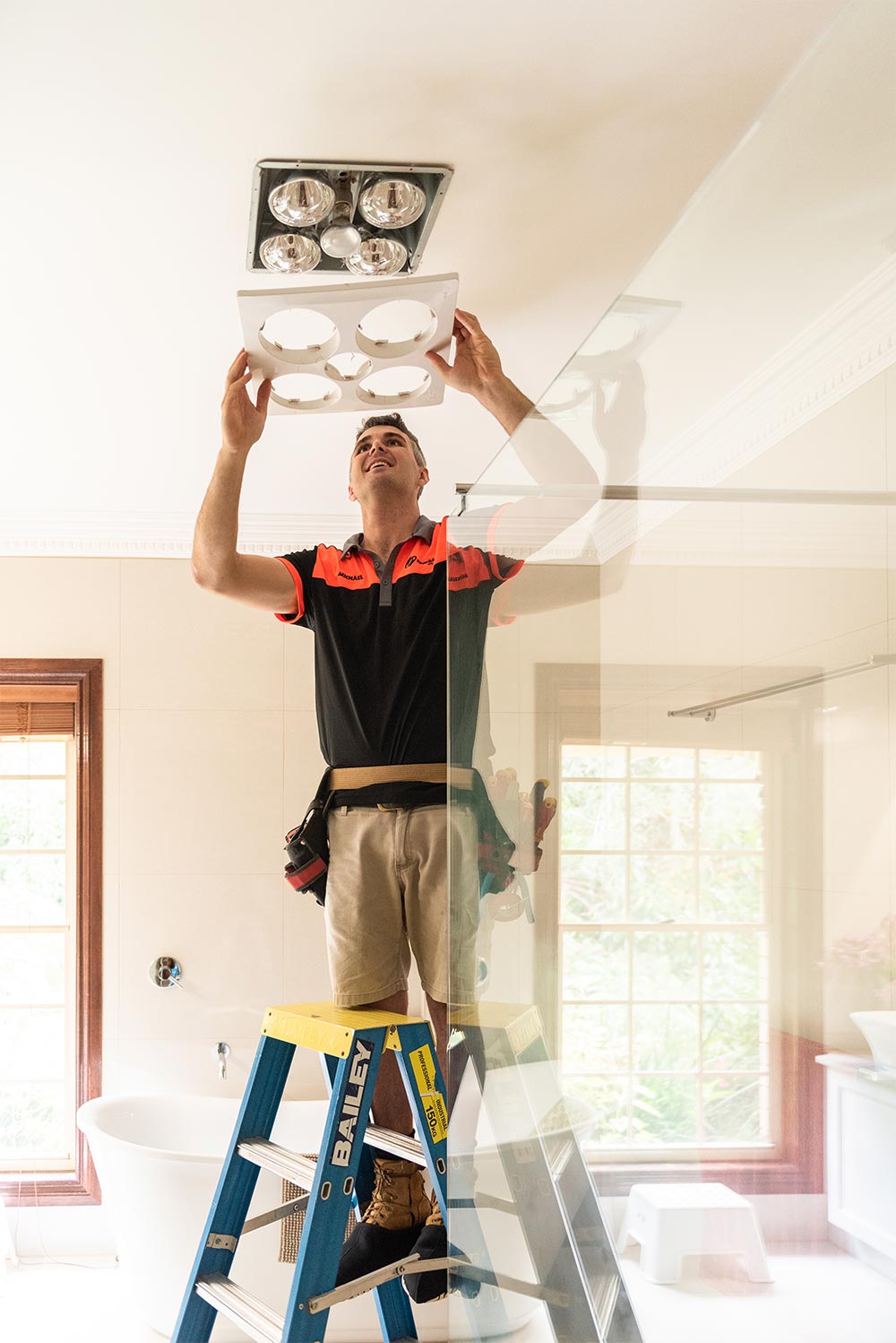 Electrician In Caloundra Installing A Bathroom Heater