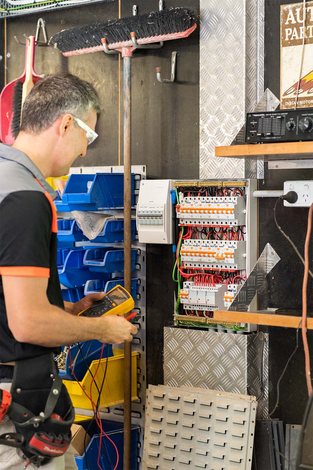 Sunshine Coast Electrician Working On Electrical Switchboard And Safety Switches