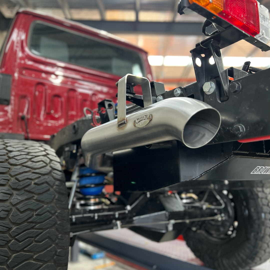 A Close Up Of Exhaust Under Car — NEID Automotive In North Gosford, NSW