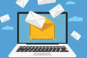 Laptop with open email envelope and floating envelopes on a blue background