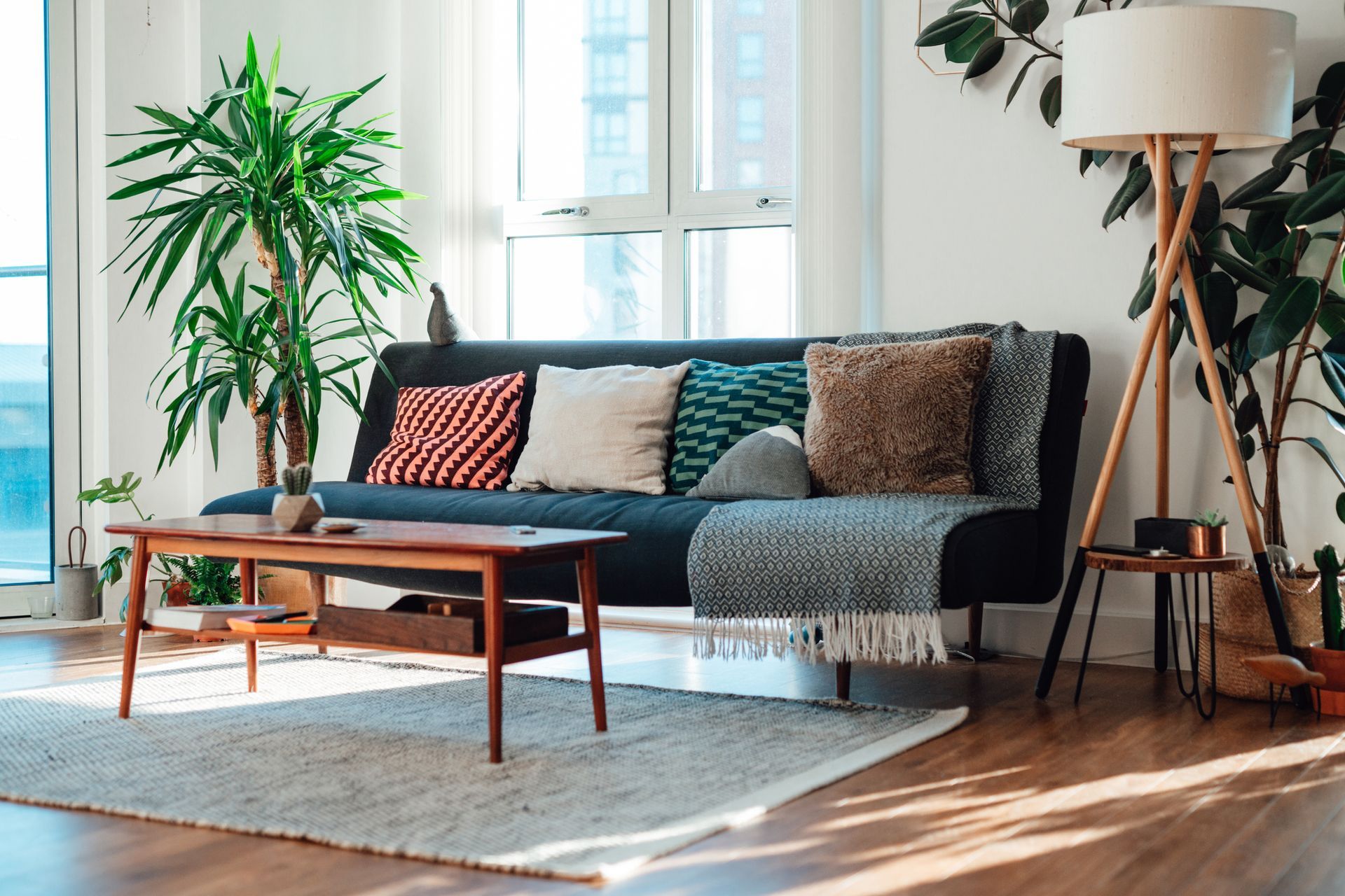 A rug in the middle of a living room.