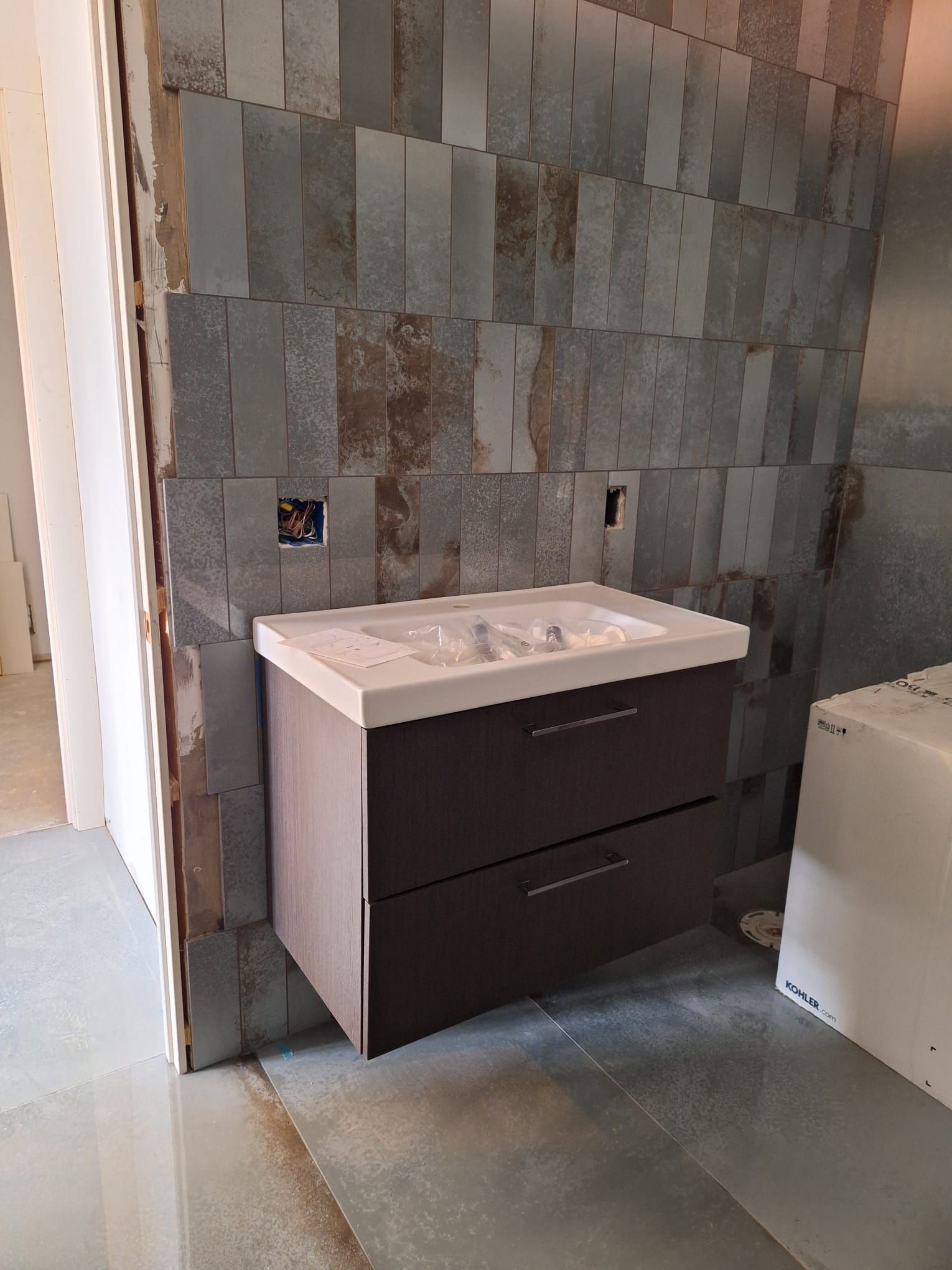 A bathroom with a sink and a bathtub in it
