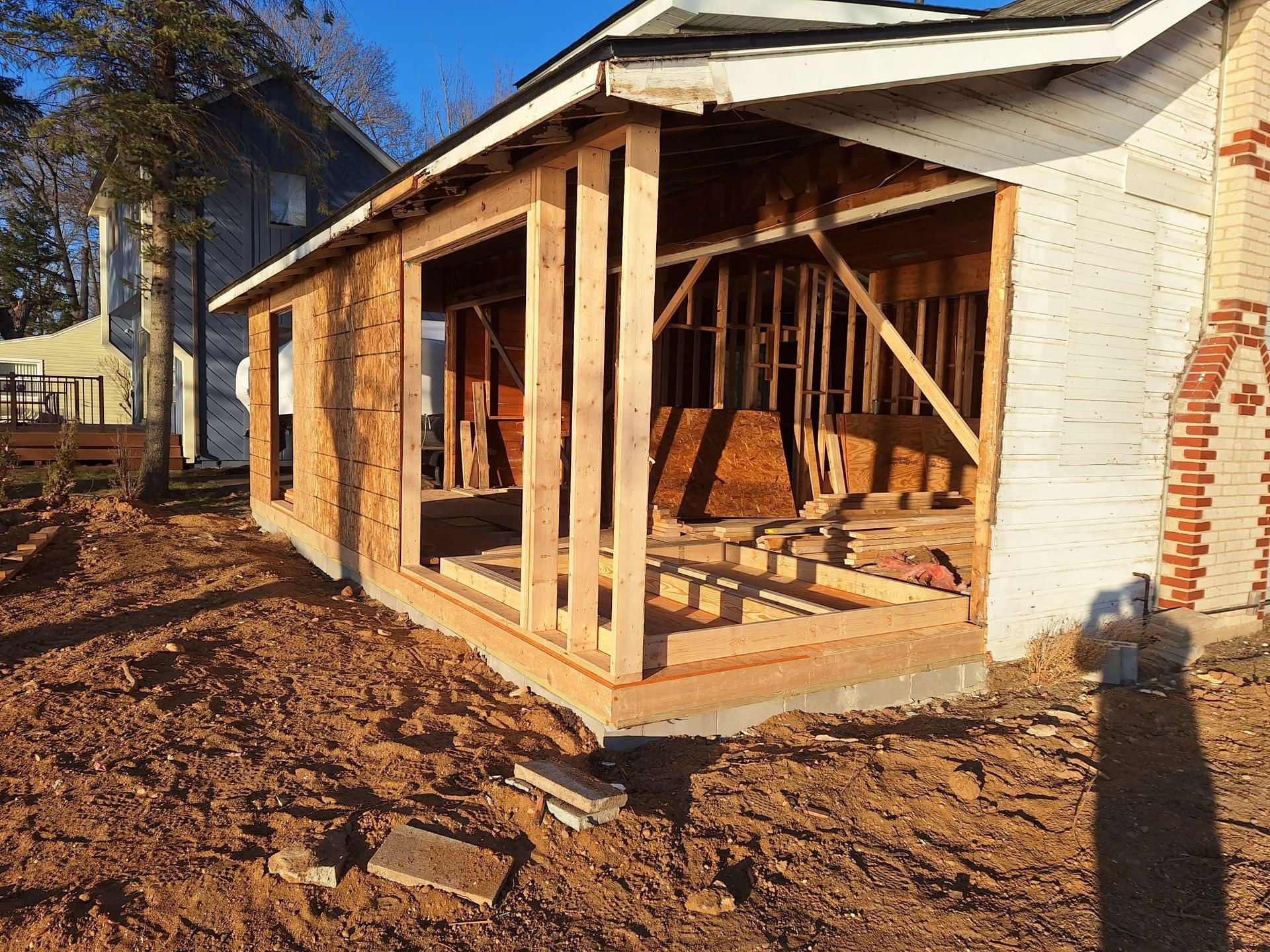 A house is being built with a lot of wood and styrofoam.