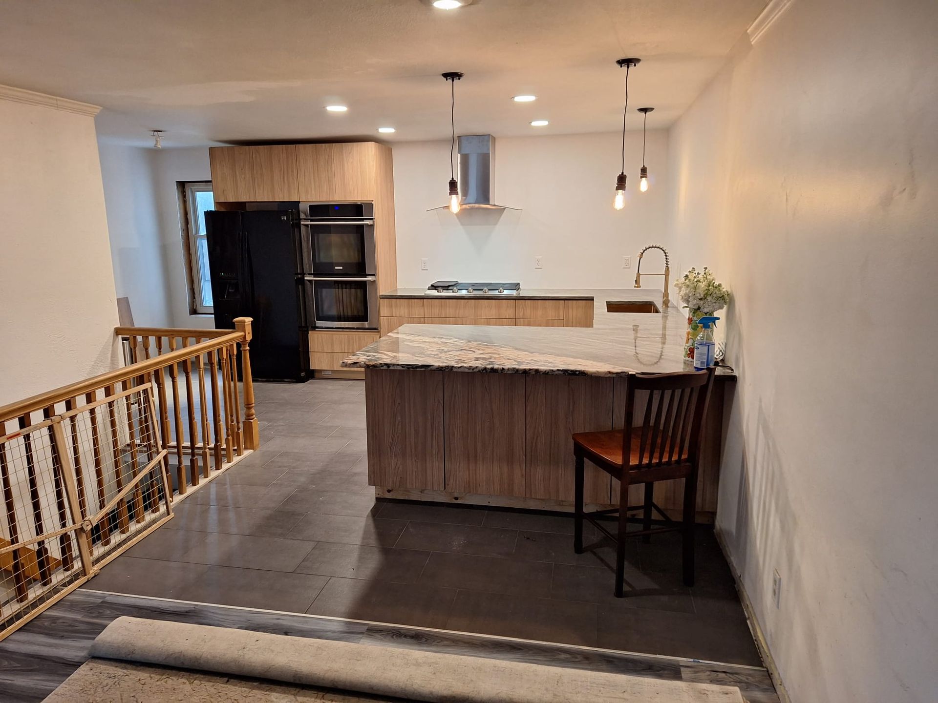 Modern kitchen with custom cabinetry and island