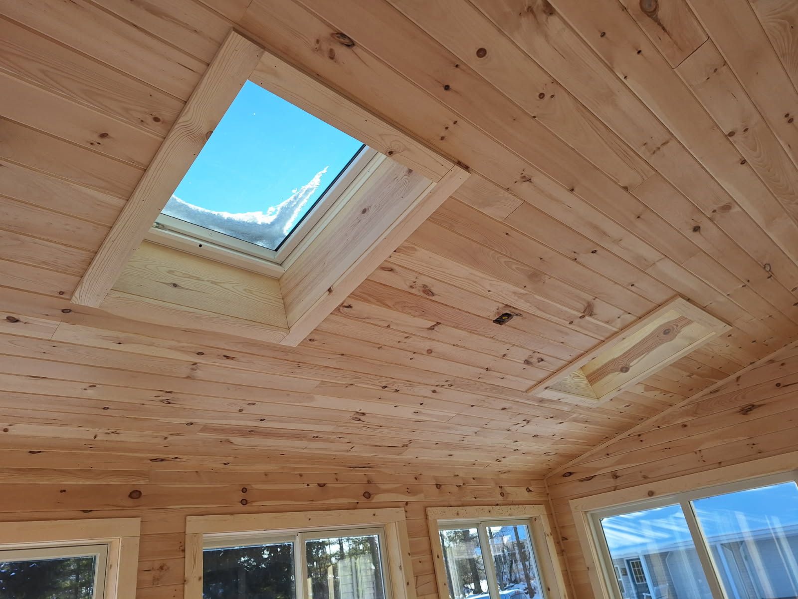 knotty pine vaulted ceiling with skylights, sunroom addition in Lapeer County, MI