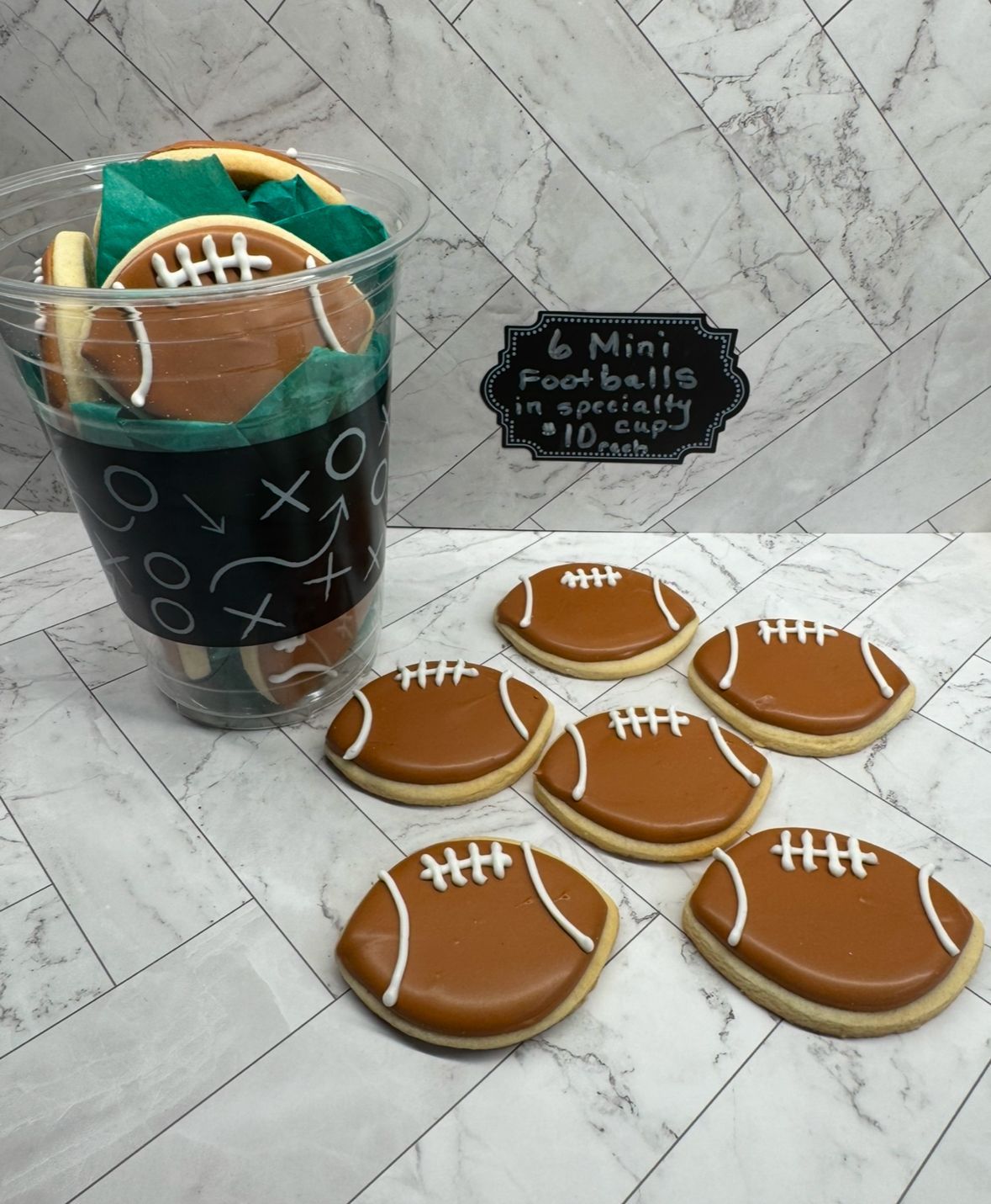 Football Mini Cookies in a specialty cup.