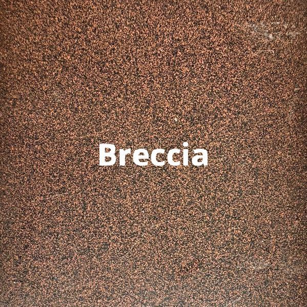 A close up of a brown surface with the word brescia written on it.