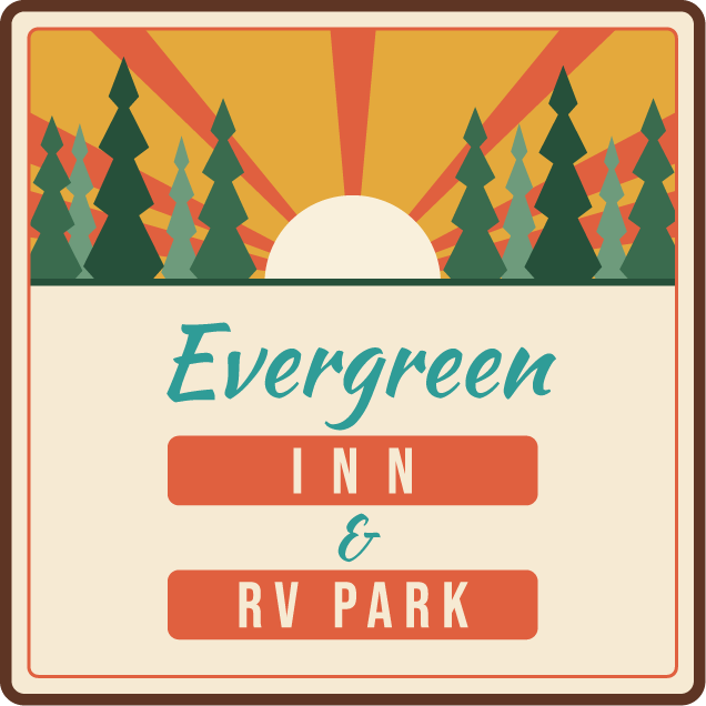 Evergreen Inn and RV Park sign with mountains, pine trees, and sunrise in warm orange and green hues