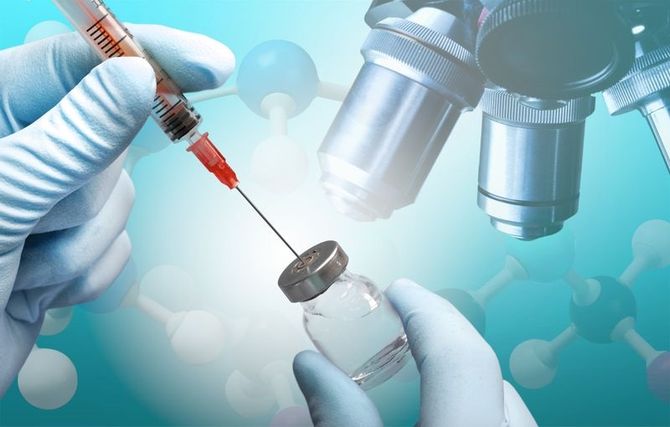 Gloved hands filling a syringe from a vial, microscope in background, molecular structures overlay.