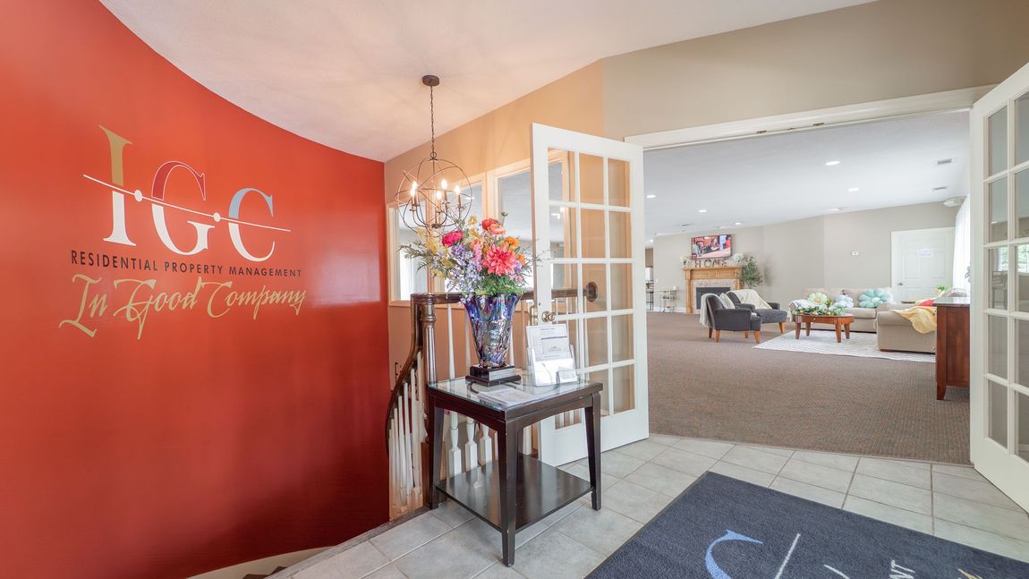 Entrance to a building with a red wall and the 