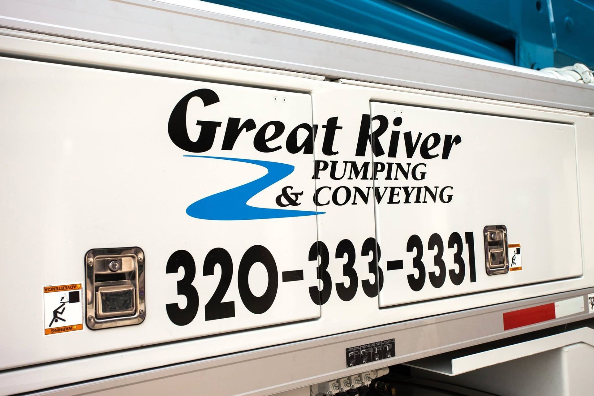 Great River Pumping & Conveying truck side with logo and phone number 320-333-3331