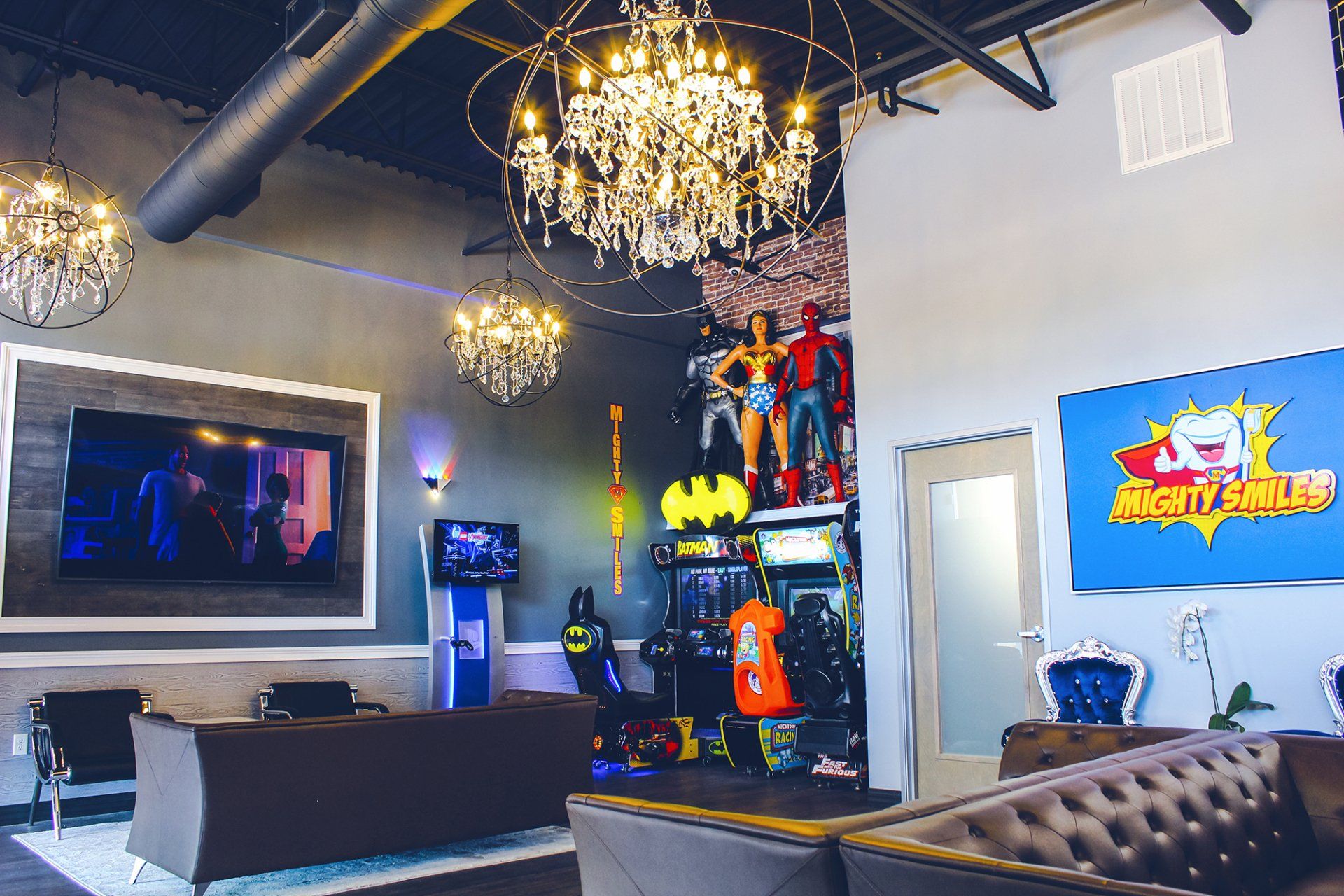 A living room with a chandelier and a sign that says superhero adventures
