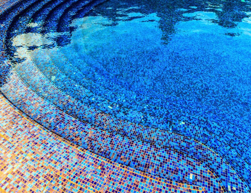 mosaic tile stair on pool