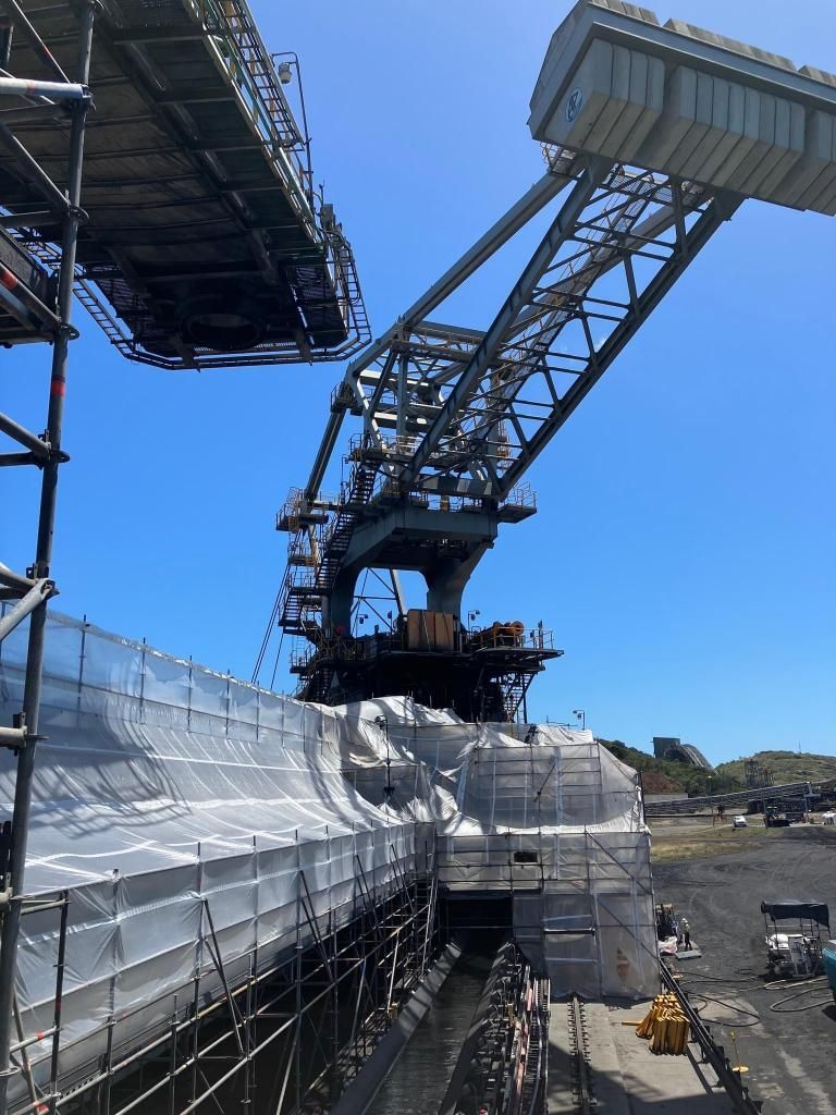 Construction Site With Large Machinery and Scaffolding, Likely for a Bridge or Elevated Structure — Tincone Pty Ltd in Paget, QLD