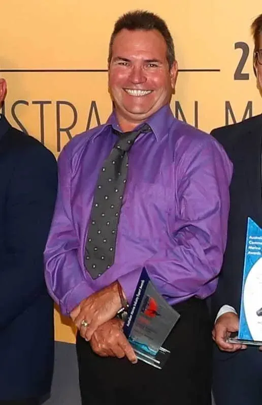 Brad accepting AIMEX Junior Exporter of the Year for Marine Air Flow