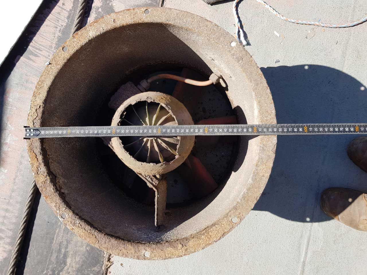 Corrosion on a fan housing due to not having mist elimination grilles installed.