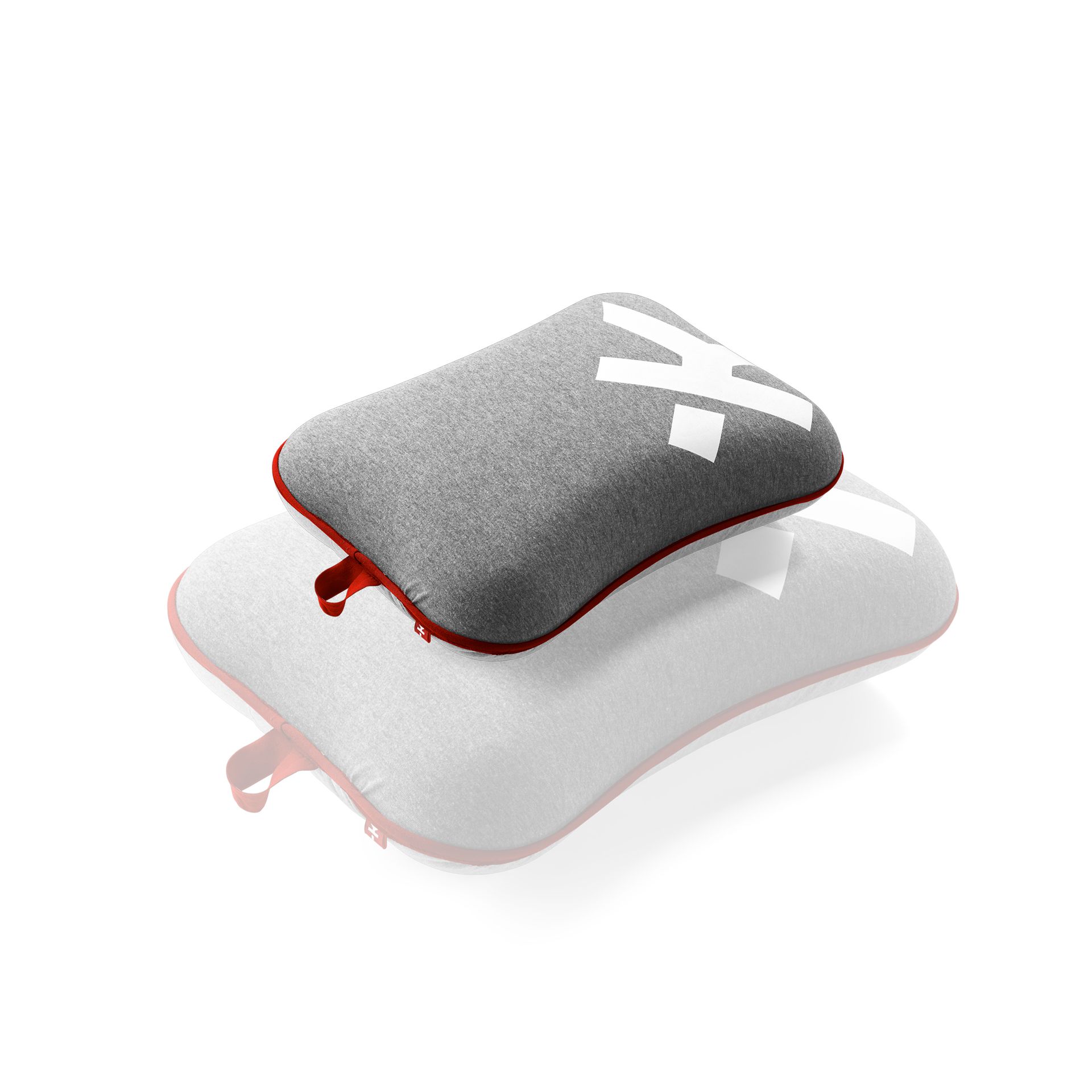 A grey and white pillow with the letter K on it