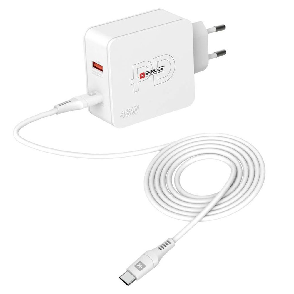 A white charger with a cable attached to it.
