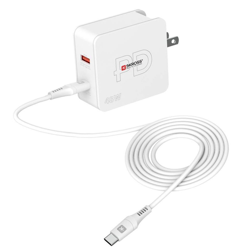 A white charger with a white cable attached to it.