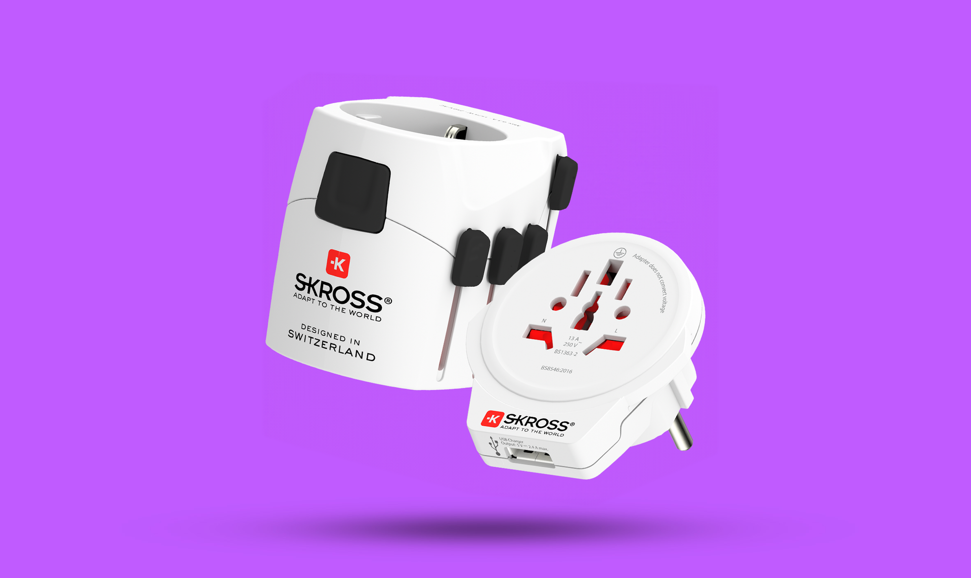 A travel adapter on a purple background.