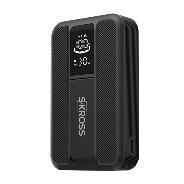 Black SKROSS portable charger with digital display on white background