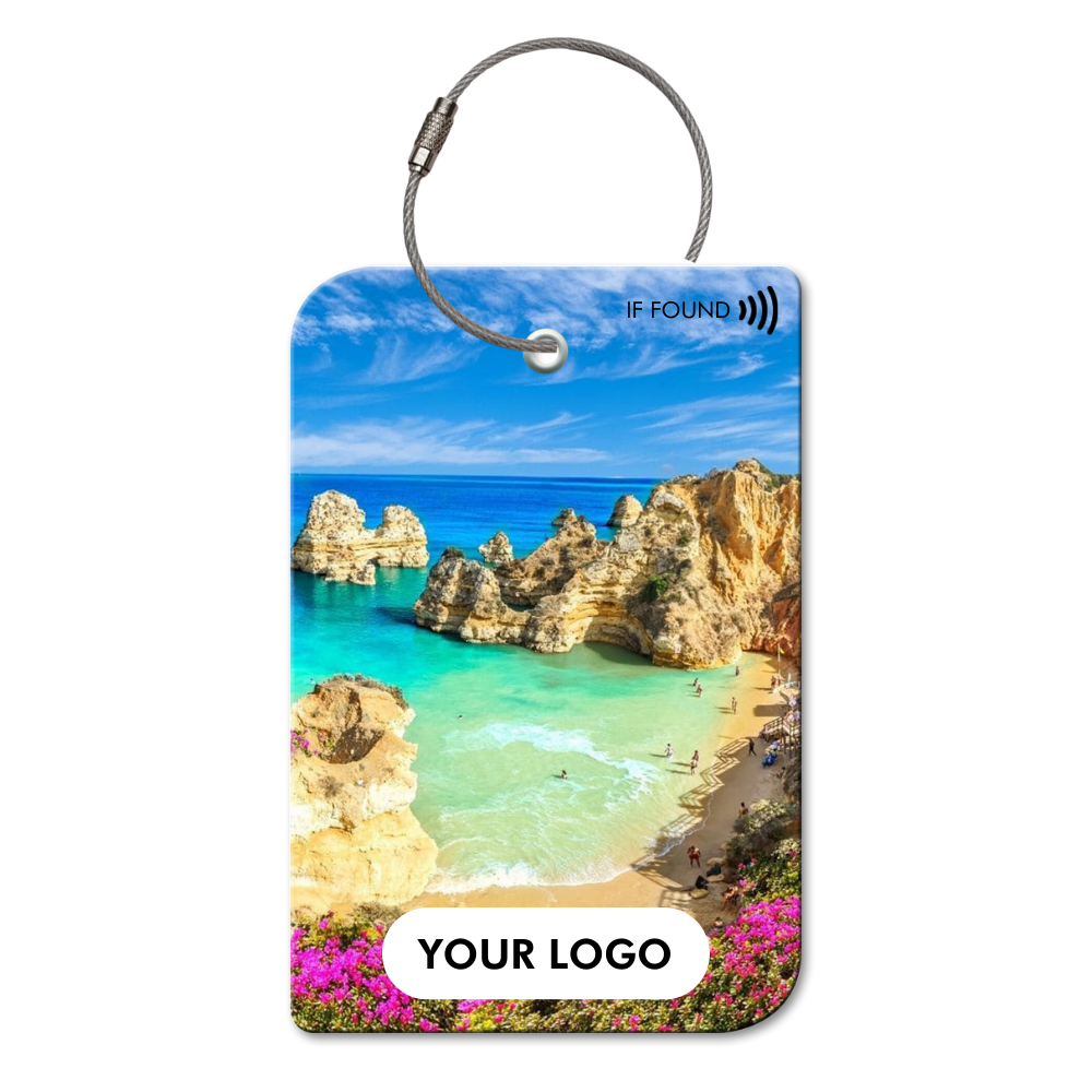 A luggage tag with a picture of a beach on it.