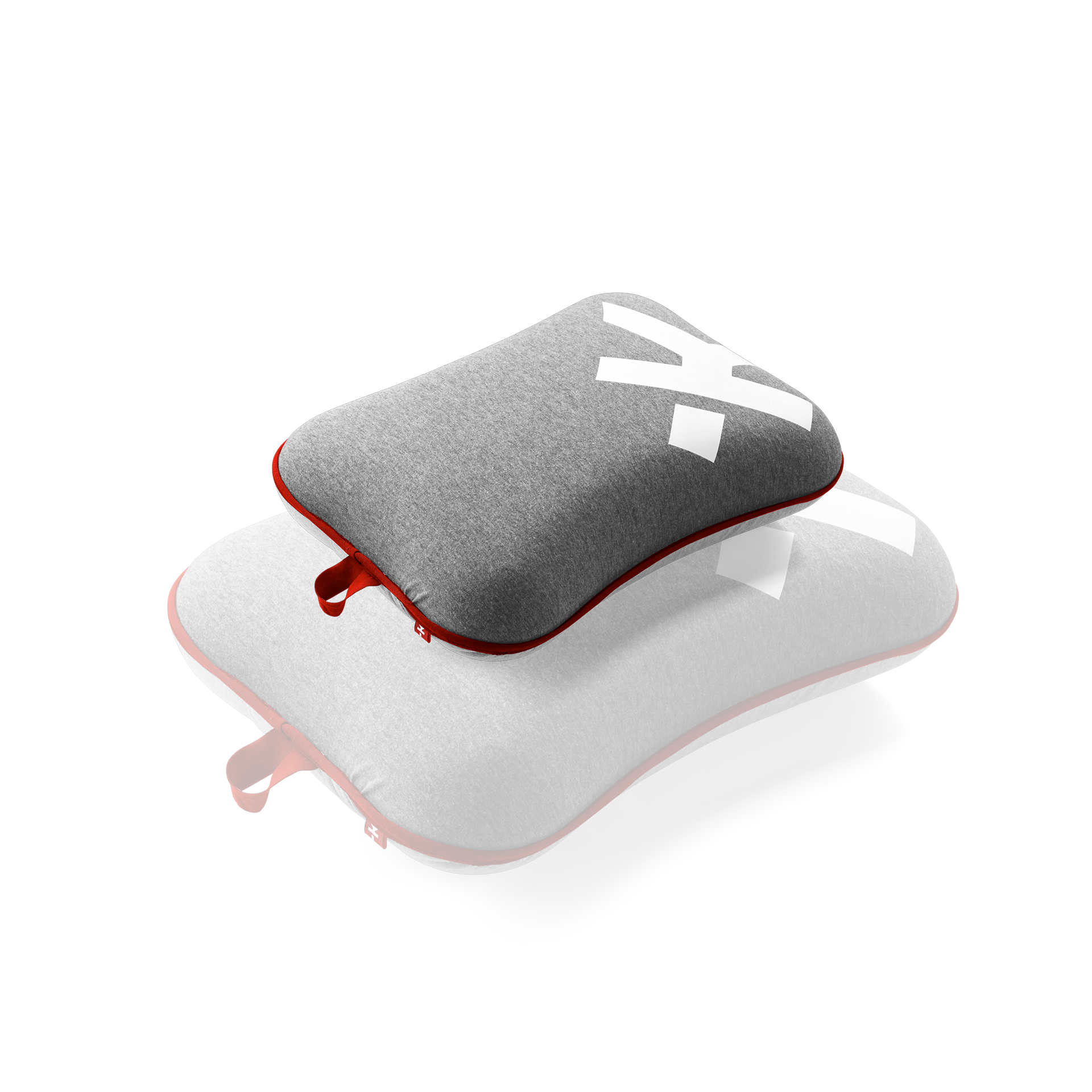 A pillow with the letter x on it