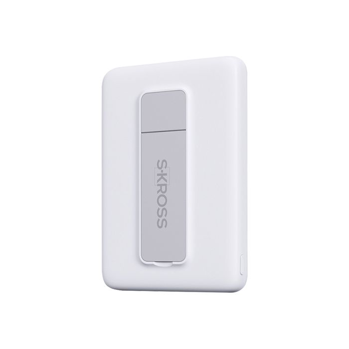 White SKROSS travel adapter with gray fold-out plug on a plain background