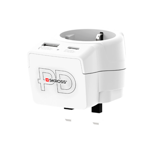 White SKROSS travel adapter with two USB ports and a plug.