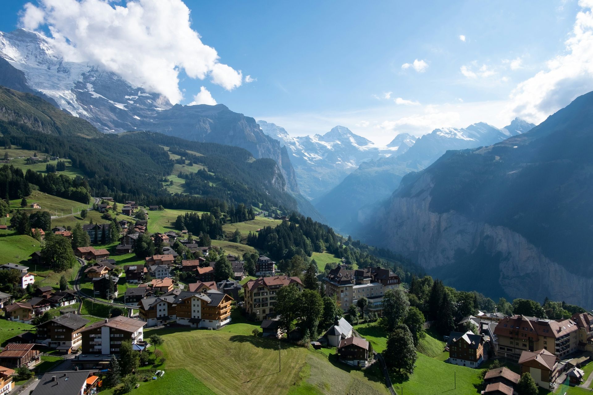 An aerial view of a small village in the mountains