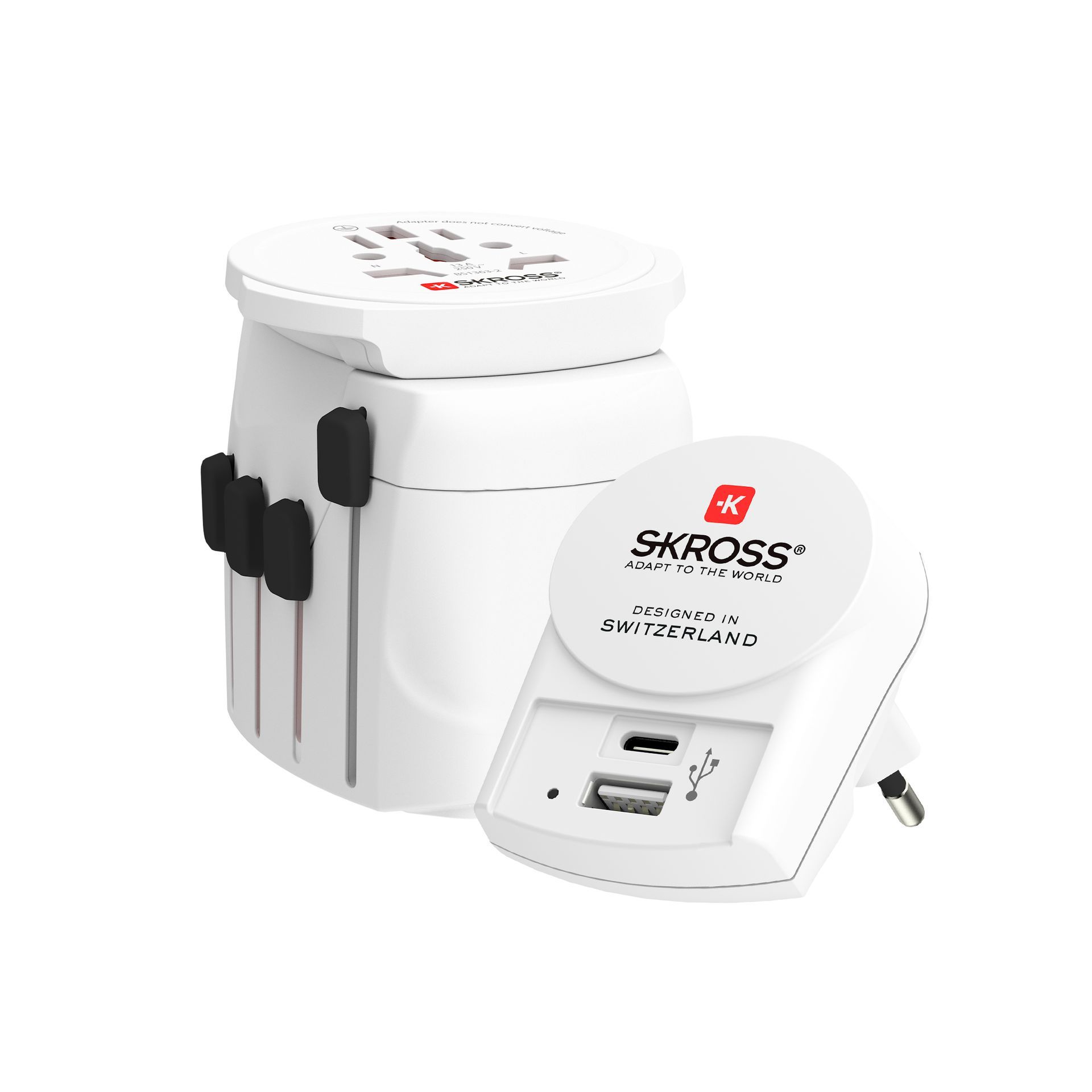 White SKROSS travel adapter with retractable plugs and a separate USB charger.